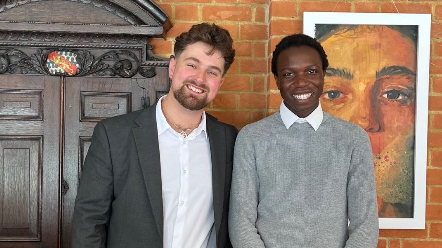 A mentor and mentee pose together at Haberdashers' Hall.