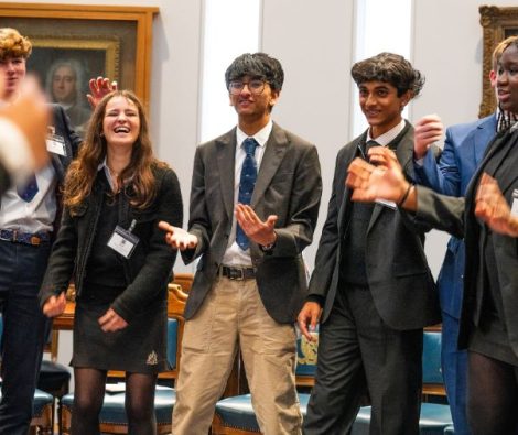 Image shows students practicing their speaking skills
